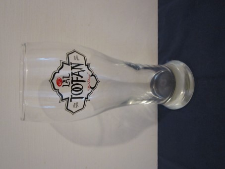 beer glass from the The Far East Beer Company brewery in England with the inscription 'Lal Toofan, Red Storm'