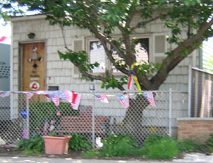 Flags as I drive by 6-01-03.jpg