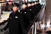 All-male high speed train crew during Spring Festival travel rush