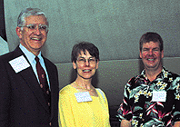 PHOTO:  President Don Michael Randal and Carol Randel met John Huggins, AB'80, at a reception in Denver on August 9.  Over 400 alumni, parents, students, and friends attended the event at the Scuptured House, owned by Huggins.