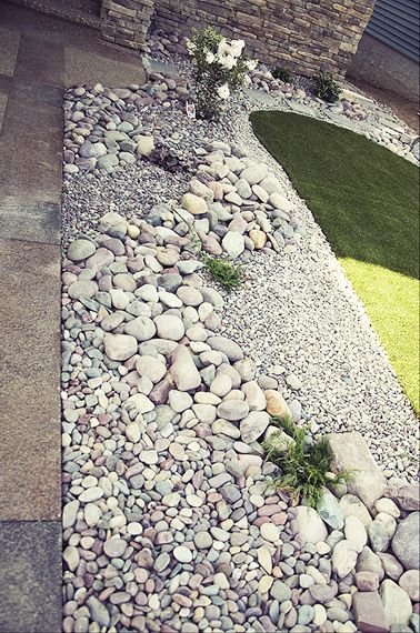 love the natural rock landscaping via St. Gregory's Landscaping