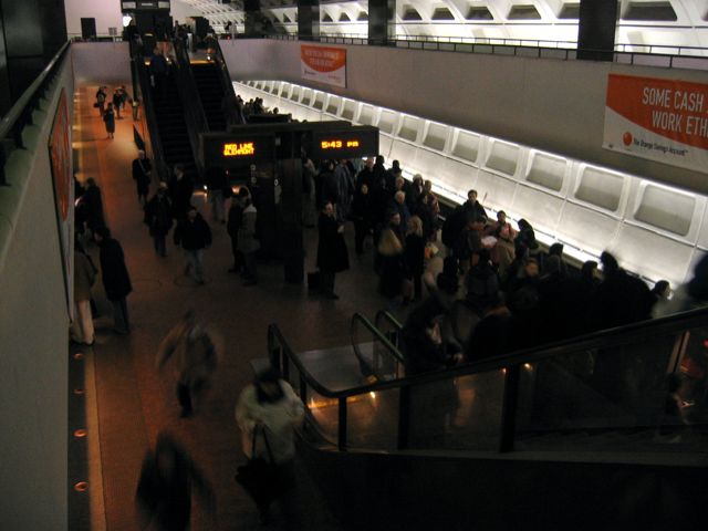 Ranks of tired commuters wait for the red line at the Farragut North station last Friday at around 5:45 p.m.