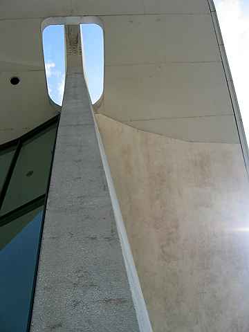 Looking up one of the concrete pillars supporting the facade of Dulles Airport