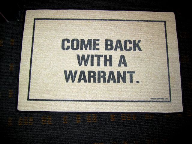 A GW law professor's doormat sitting in the hall outside his office.