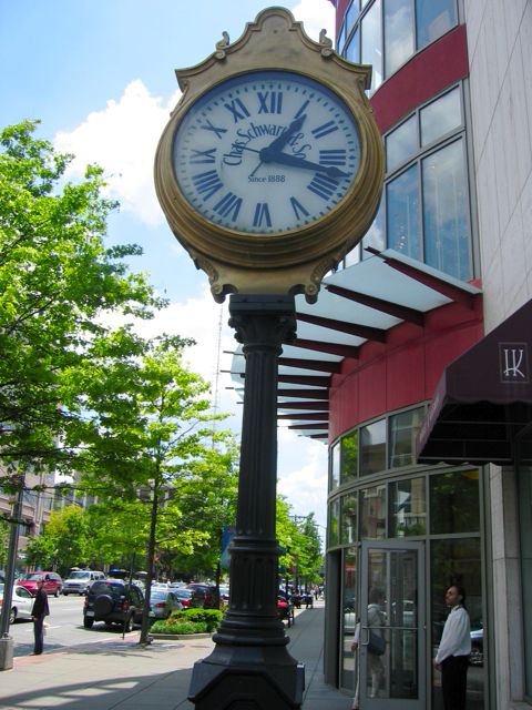 A large clock on the sidewalk on Wisconsin Ave. near Military Road.