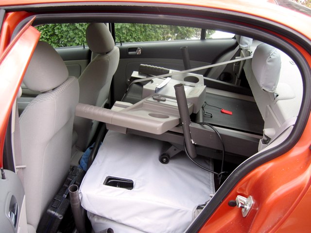 Our new treadmill in the backseat of the car.