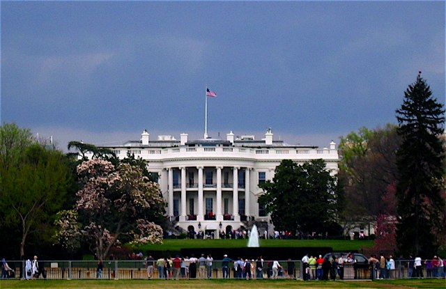 Dark clouds move in over the White House.