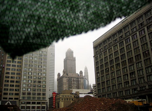 The view through a fence around a construction site near Washington and State in downtown Chicago.