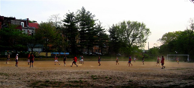 Players kick up some soccer dust at Walter Pierce  Park.