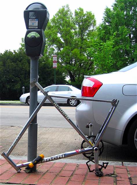 The remains of a bike locked to a parking meter on Calvert St.