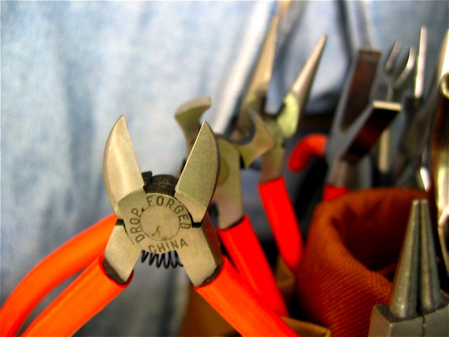 A macro view of some of my sister's beadworking tools.