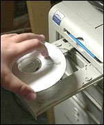 CD being placed in computer