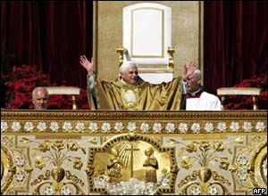 Pope Benedict greets the crowds in St Peter's Basilica and the square from the altar 