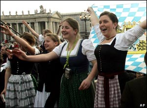 A crowd of people from Bavaria wave a flag in St Peter's Square, Vatican