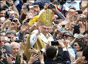 Crowds take photos of Pope Benedict XVI