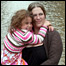 A woman and her child in the floods