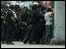 Chinese security forces detain protesters