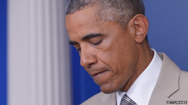 President Barack Obama pauses during a press conference on 28 August.