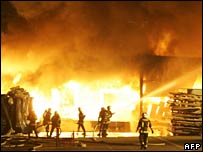 Firefighters battle a fire in Aulnay-sous-Bois, near Paris on 4 November 2005