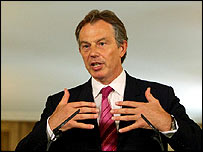 Tony Blair at an earlier media conference