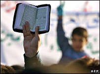 Sunni Muslim protest against a raid on the Umm al-Qura mosque