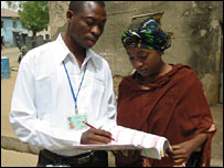 Nigerians filling in census form