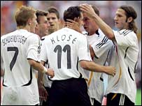 Miroslav Klose is congratulated after putting Germany back in front against Costa Rica