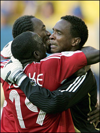 Shaka Hislop is congratulated by his Trinidad and Tobago team-mates