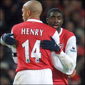 Thierry Henry celebrates with Toure after he scores the equaliser