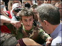 Nationalist about to punch gay rights activists Peter Tatchell