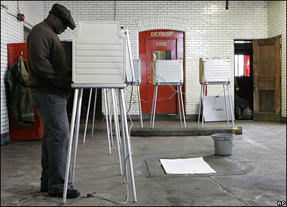 A voter casts his ballot in a fire station in Detroit, Michigan