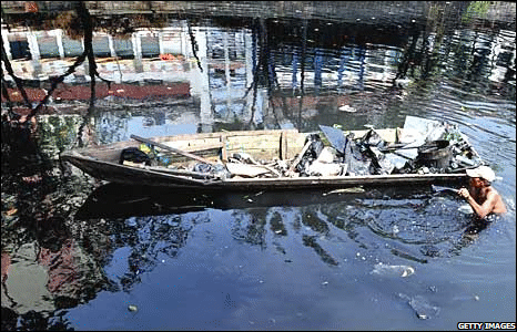 A scavenger at work in the Citarum river in the Indonesian capital, Jakarta