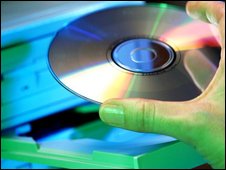 CD being placed in computer, Eyewire