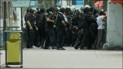 Chinese security forces detain protesters