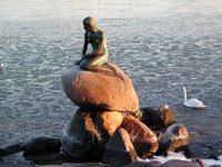 Statue of Little Mermaid, Copenhagen harbor. Full image located at http://photos1.blogger.com/blogger/1506/1865/1600/Copenhagen-Mermaid_statue.jpg; thumbnail links to page of photographs of Danish architecture