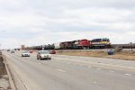 DME 3832 leads 644 past another ethanol train as it pulls down to B-17