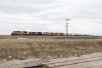 Empty sand train RPGAWS-16 comes around the curve shortly after departing northward from Proviso