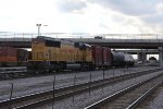 With a single SD60M for power, YPRCP shoves into Bensenville while building their outbound train