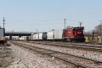 CP 4403 shoves a long cut of cars back toward the classification yard