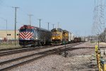 An inbound Scoot races east as MELNP waits to head west on Track 2