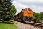 BNSF6935, BNSF5039, BNSF6585, BNSF6761 at the head of 7 "light" engines passing Peck Park