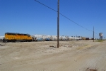 UP 1347 sits idle on a string of reefers 