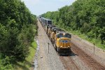 UP 4977 Heads up a Up stack train on the BNSF Marceline Sub.