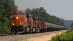 BNSF 8156 leads an oil train south at Dexter Missouri