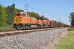 BNSF 5285 Drags a tie train down the K line. 