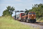 BNSF 8182 Roars under the ex Santa Fe signal bridge. 