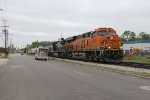 BNSF 8362 & CSX 7720 dig in as they begin the climb east out of Grand Rapids with D702