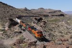 Part way up the canyon wall, BNSF 3929 leads H-BARTUL9 east