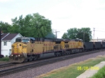 UP 7037 heads'm west.