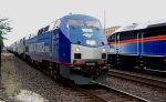 John Kerry tour locomotive meets Metra MP36